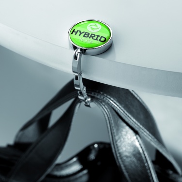 Logotrade dāvanas foto: Rokassomu turētājs jūsu rakstāmgaldam